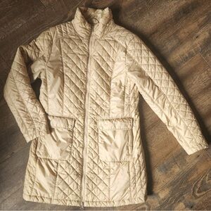 Ladies North Face winter coat, gold in color, like new condition! Sz. Large